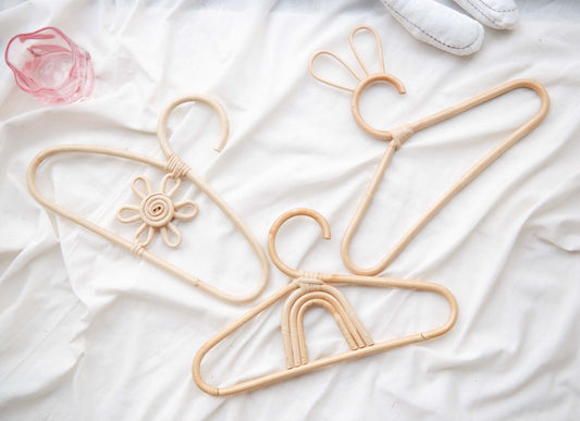 Rattan hangers for nurseries in rainbow, bunny, and daisy designs, ideal for organizing baby essentials, Baby Clothes hanger